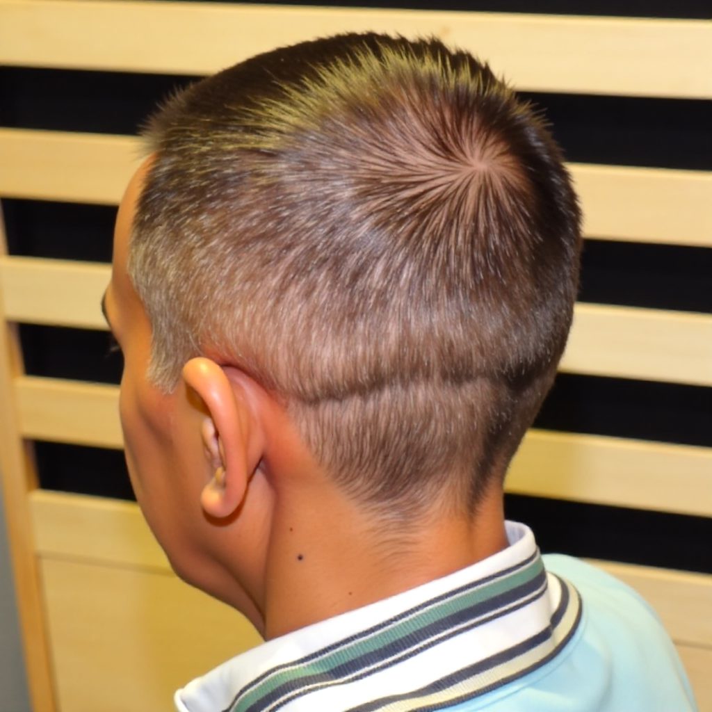 Black little boys haircut with shaved design